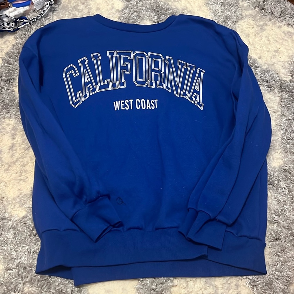 Blue crew neck size medium
